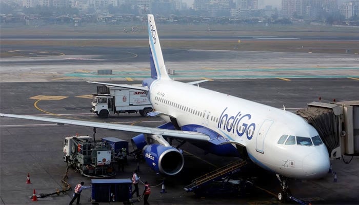 An IndiGo Airlines Airbus A320 aircraft is pictured parked at a gate at Mumbai airport in this undated image. — Reuters