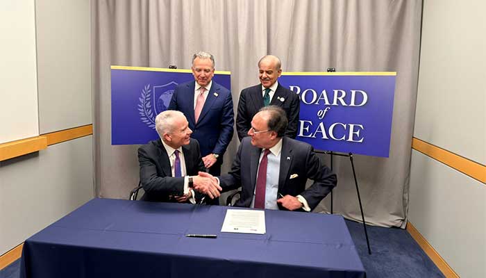 US GSA Administrator Edward C Forst (front left) and Finance Minister Senator Muhammad Aurangzeb (front right) shake hands after signing an MoU for redevelopment of Roosevelt Hotel in New York. Prime Minister Shehbaz Sharif and US Special Envoy Steve Witkoss witness the signing of agreement. — Ministry of Finance