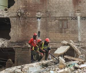 At least seven killed as first-floor gas blast brings down part of building in Karachi