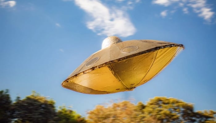 Representational image shows a toy UFO in the air. — Pexels