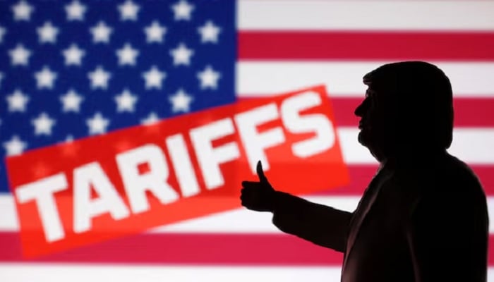 A 3D-printed miniature model depicting U.S. President Donald Trump, US flag and the word Tariffs in this illustration taken on April 17, 2025.— Reuters