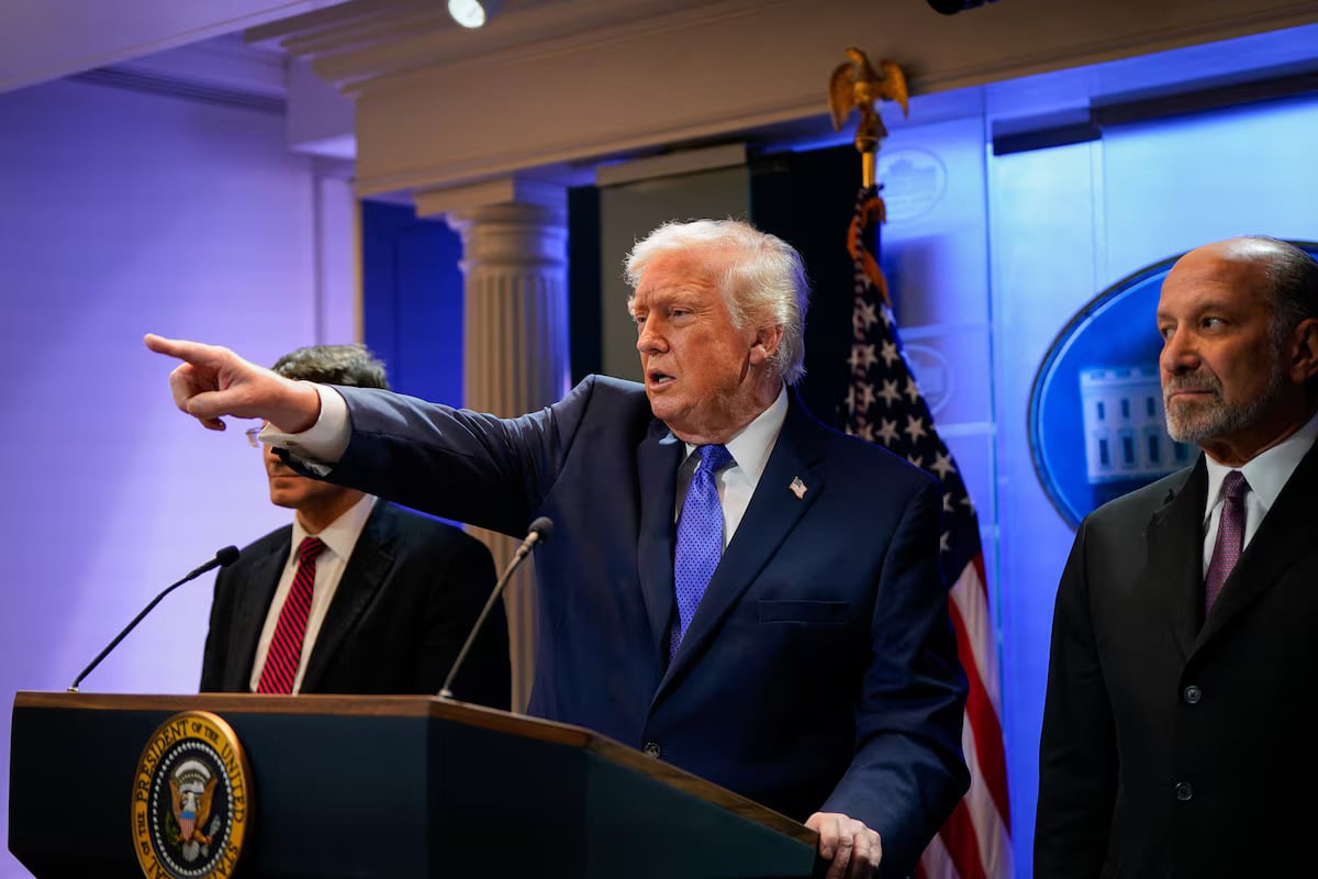 US President Donald Trump and Secretary of Commerce Howard Lutnick attend a press briefing at the White House, following the Supreme Courts ruling that Trump had exceeded his authority when he imposed tariffs, in Washington, DC, US, January 20, 2026. — Reuters