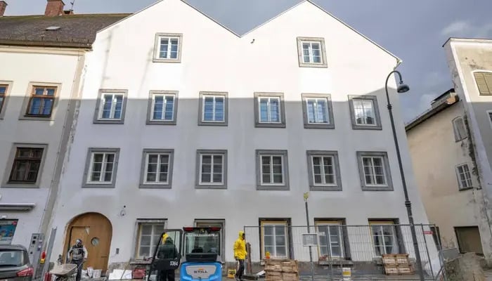 Workers are finishing works at the birth house of former German dictator Adolf Hitler that is turned into a police station, pictured on February 17, 2026 in Braunau am Inn, Austria. — AFP