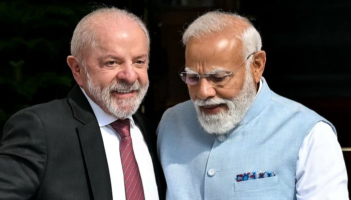 Prime Minister Narendra Modi and President Luiz Inacio Lula da Silva walk before their meeting at the Hyderabad House in New Delhi on February 21, 2026. — AFP