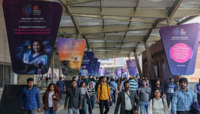 Visitors arrive at Bharat Mandapam, one of the venues for AI Impact Summit, in New Delhi, India, February 20, 2026. — Reuters