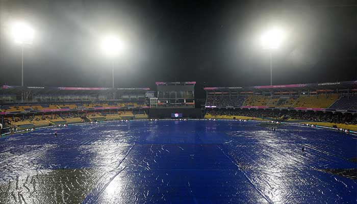 Ground staff cover the field as rain delayed the start of the 2026 ICC Mens T20 Cricket World Cup Super Eight match between Pakistan and New Zealand at the R Premadasa Stadium in Colombo on February 21, 2026. — PCB