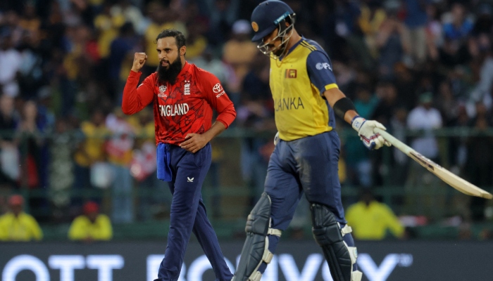 Englands Adil Rashid (left) celebrates after taking the wicket of Sri Lankas Dilshan Madushanka during their ICC Mens T20 World Cup 2026 Super Eight clash at the Pallekele International Cricket Stadium, Kandy, February 22, 2026. — Reuters