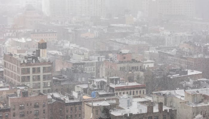 Powerful winter storm shuts schools, disrupts travel across US Northeast 10 Snow covers residential buildings during a winter storm in the Brooklyn Borough of New York City, US, February 22, 2026. — Reuters