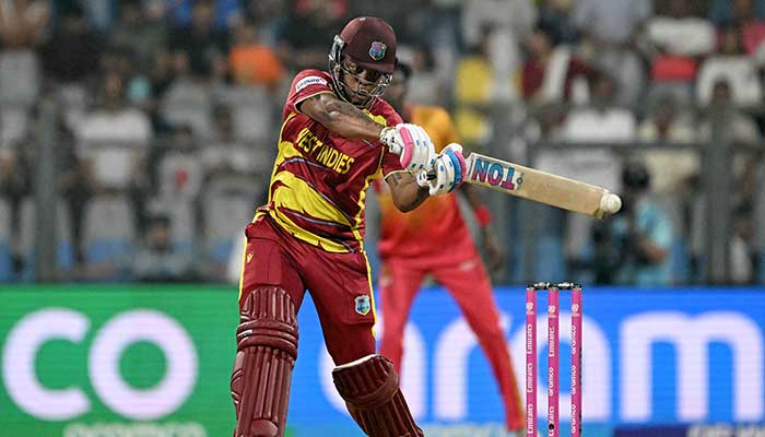 West Indies Shimron Hetmyer plays a shot during the 2026 ICC Mens T20 Cricket World Cup Super Eights match between West Indies and Zimbabwe at the Wankhede Stadium in Mumbai on February 23, 2026. — AFP