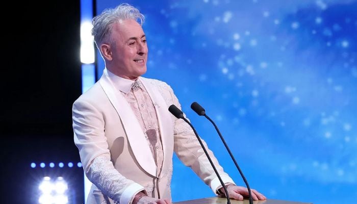 Racial slur during BAFTAs prompts on-air apology from host Alan Cumming