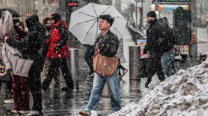 Powerful winter storm shuts schools, disrupts travel across US Northeast