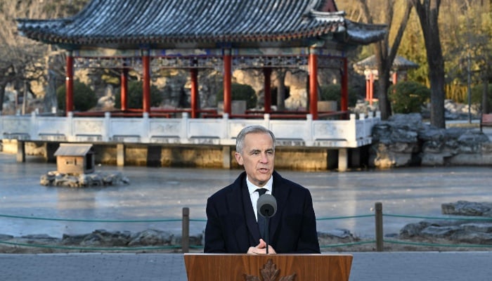Canada PM to push trade, rebuild fractured ties in India trip 8 Canadas Prime Minister Mark Carney speaks during a press conference at Ritan Park in Beijing on January 16, 2026. — AFP