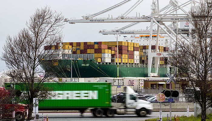 A view of cargo ship with shipping containers at the port of Oakland in Oakland, California, US, February 23, 2026. — Reuters