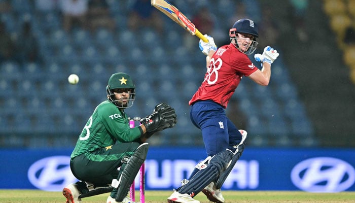 Englands captain Harry Brook (R) plays a shot as Pakistans wicketkeeper Usman Khan fields during the 2026 ICC Mens T20 Cricket World Cup Super Eights match between England and Pakistan at the Pallekele International Cricket Stadium in Kandy on February 24, 2026.  — AFP