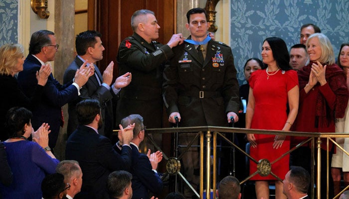 Chief Warrant Officer Eric Slover receives the Congressional Medal of Honor during President Donald Trump´s State of the Union address during a Joint Session of Congress at the US Capitol on February 24, 2026. — AFP