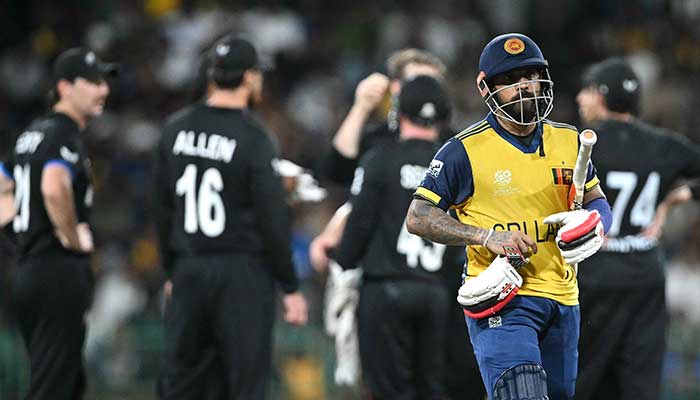 Sri Lankas Kusal Mendis walks back after getting out as New Zealand players celebrate during the 2026 ICC Mens T20 Cricket World Cup Super Eights match between Sri Lanka and New Zealand at the R Premadasa Stadium in Colombo on February 25, 2026. — AFP