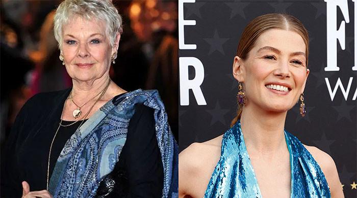 Judi Dench gets shocking label by James Bond co-star Rosamund Pike