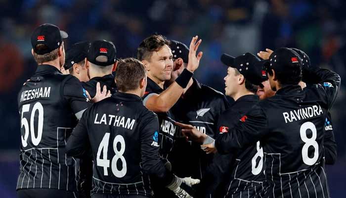 New Zealands Tom Latham celebrates with teammates after taking the wicket of Indias Suryakumar Yadav run out off the bowling of Trent Boult.— Reuters/File