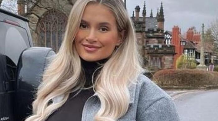 Molly Mae Hague keeps it casual and glowing during airport arrival