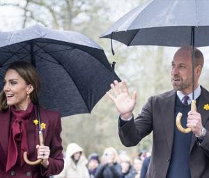 Prince William and Kate's rainy visit finds Aston Villa waiting