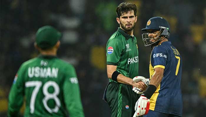 Pakistans Shaheen Shah Afridi (centre) shakes hands with Sri Lankas Dasun Shanaka (right) after conclusion of the Super Eight match of ICC Mens T20 World Cup 2026 at Pallekele International Cricket Stadium in Kandy on February 28, 2026. — AFP