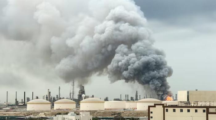 Iran warns retaliation against US-linked energy assets after Trump's Kharg strike claim