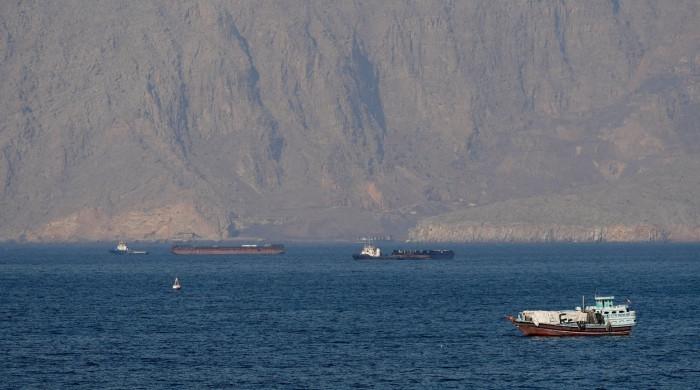 Tanker crew abandons vessel after reported projectile strike in Strait of Hormuz