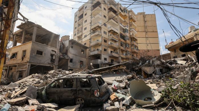 Iran vows 'heavy price' after civilian nuclear sites struck as war enters second month