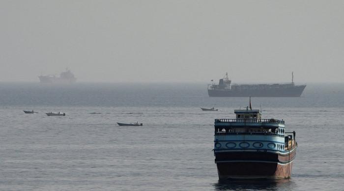 Iran links Hormuz reopening to US concessions as 'semi-negotiations' continue