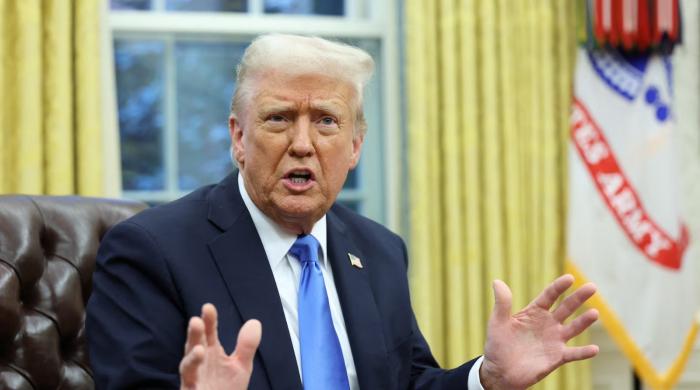 Trump says someone within Iran better to lead after war as Tehran threatens strikes on Mideast economic hubs