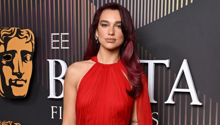 Dua Lipa takes the stage at BRIT awards after skipping the red carpet