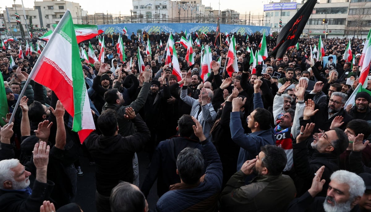 People react as they gather at the Enghelab Square, after Irans Supreme Leader Ayatollah Ali Khamenei was killed in Israeli and US strikes on Saturday, in Tehran, Iran, March 1, 2026. — Reuters