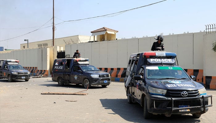 Police vehicles patrol after a protest outside the US Consulate General, following news of US and Israeli strikes on Iran that martyred Irans Supreme Leader Ayatollah Ali Khamenei, in Karachi on March 1, 2026. — Reuters