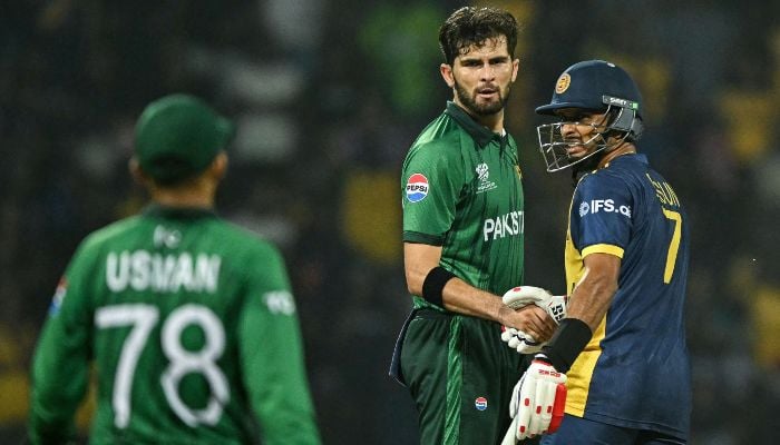 Pakistans Shaheen Shah Afridi (C) shakes hands with Sri Lanka´s captain Dasun Shanaka (R) at the end of the 2026 ICC Mens T20 Cricket World Cup Super Eights match between Sri Lanka and Pakistan at the Pallekele International Cricket Stadium in Kandy on February 28, 2026. — AFP