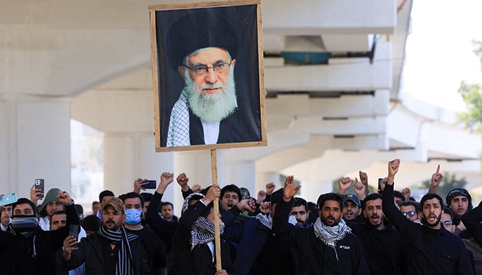 Protesters demonstrate near the entrance of the Green Zone after assassination of Irans Supreme Leader Ayatollah Ali Khamenei, in Baghdad, Iraq, March 1, 2026. — Reuters