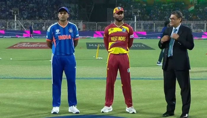 India captain Suryakumar Yadav (left) and Shai Hope (centre) at the toss for their ICC Mens T20 World Cup Super Eights match at the Eden Gardens in Kolkata on March 1, 2026. — Screengrab via Livestream