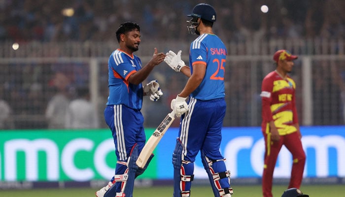Indias Sanju Samson and Shivam Dube celebrate after the ICC Mens T20 World Cup match against West Indies on March 1, 2026. — Reuters