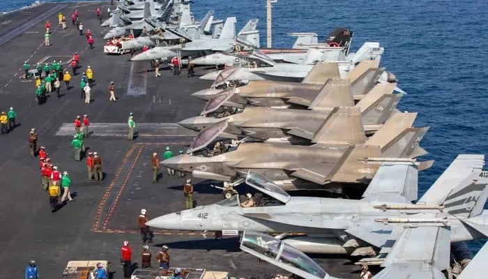 Aircraft sit on the flight deck of the United States Navy Nimitz-class aircraft carrier USS Abraham Lincoln in support of the Operation Epic Fury attack on Iran, February 28, 2026. — Reuters