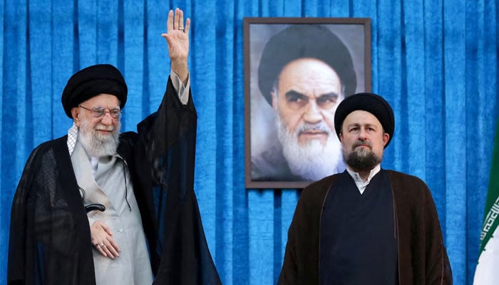 Ayatollah Ruhollah Khomeinis grandson, Hassan Khomeini, stands next to Irans Supreme Leader Ayatollah Ali Khamenei during the 36th anniversary of the death of the leader of Irans 1979 Islamic Revolution, Ayatollah Ruhollah Khomeini, at Khomeinis shrine in southern Tehran, Iran June 4, 2025. — Reuters