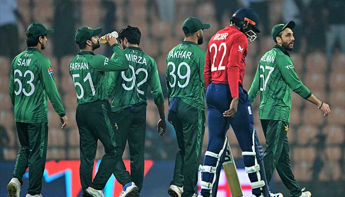 Pakistans captain Salman Agha (R) walks back to the pavilion with teammates after their loss against England at the end of their 2026 ICC Mens T20 Cricket World Cup Super Eights match in the Pallekele International Cricket Stadium, Kandy on February 24, 2026. — AFP
