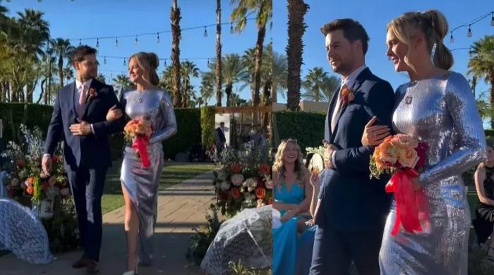 JoJo Siwa stuns at brother's wedding with Chris Hughes by her side
