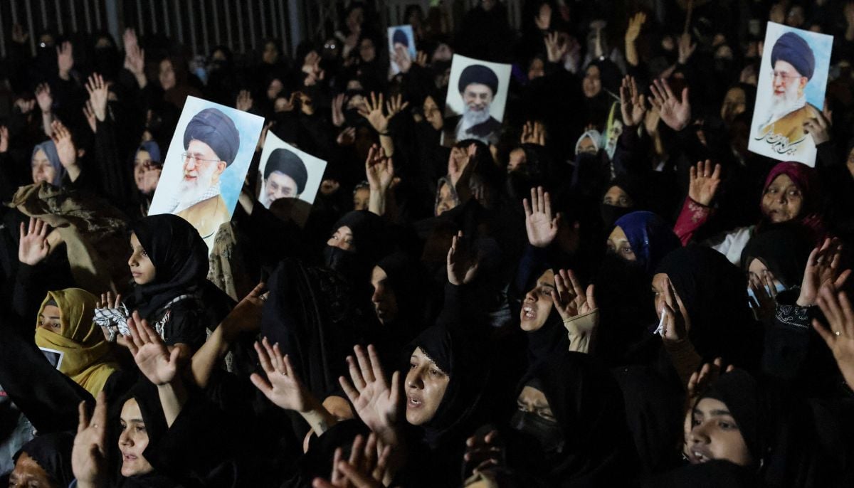Women chant slogans in Karachi on March 2, 2026, as they mourn the death of late Irans Supreme Leader Ayatollah Ali Khamenei. — Reuters