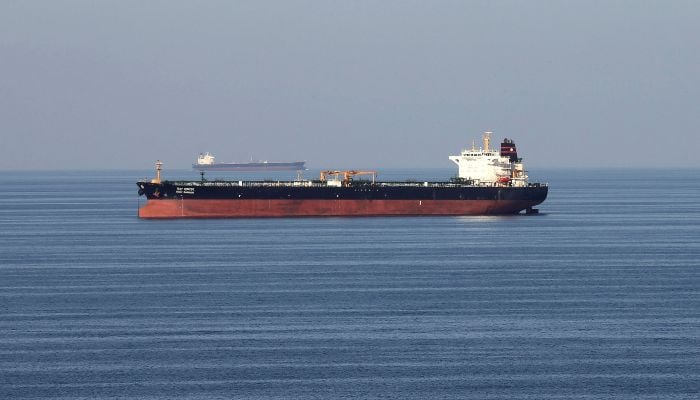 Global oil, gas shipping costs surge as Iran vows to close Strait of Hormuz 13 Oil tankers pass through the Strait of Hormuz, December 21, 2018. — Reuters