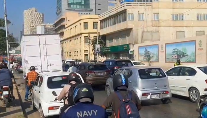 A screengrab taken from a video shows vehicles parked bumper to bumper amid severe congestion on II Chundrigar Road, Karachi, on March 3, 2026. — Geo News