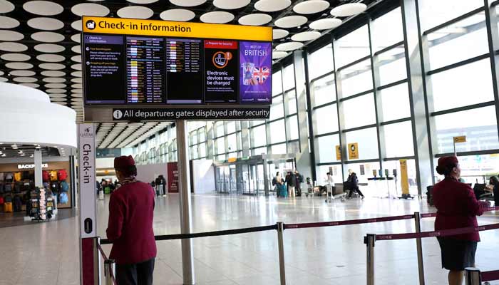 Qatar airline staff stand by a departure board displaying cancelled flights to Middle East countries amid the US-Israel conflict with Iran, at Heathrow Airport Terminal 4, in Greater London, Britain, March 2, 2026.— Reuters/File