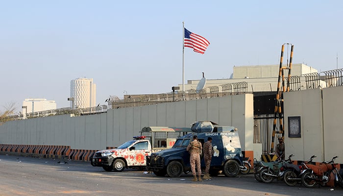 Police and paramilitary vehicles stand outside the US Consulate General, a day after a protest following news of US and Israeli strikes on Iran that martyred Supreme Leader Ayatollah Ali Khamenei, in Karachi, March 2, 2026. — Reuters