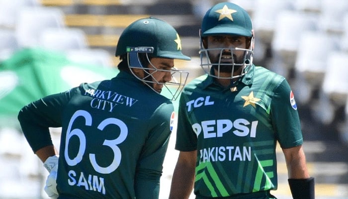 Pakistan cricketers Babar Azam and Saim Ayub during the second ODI match against South Africa in Cape Town on December 19, 2024. — AFP