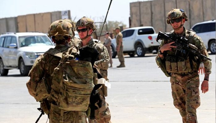 US soldiers are seen during a handover ceremony of Taji military base from US-led coalition troops to Iraqi security forces, in the base north of Baghdad, Iraq August 23, 2020. — Reuters