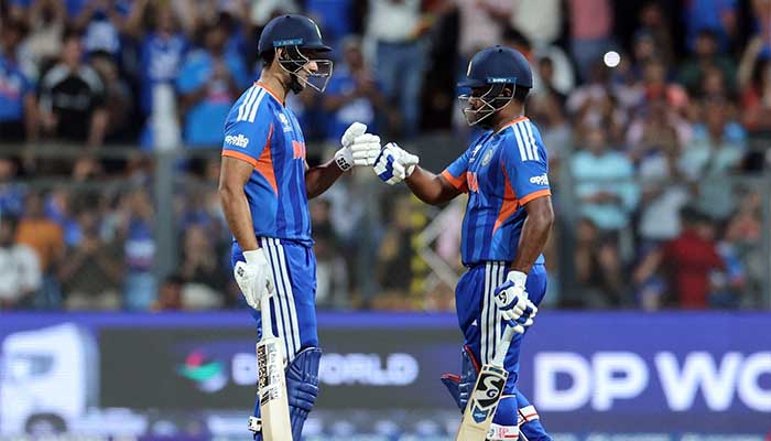 Indias Sanju Samson and Shivam Dube bump fists during their ICC Mens T20 World Cup 2026 semi-final against England at Wankhede Stadium, Mumbai, on March 5, 2026. — Reuters