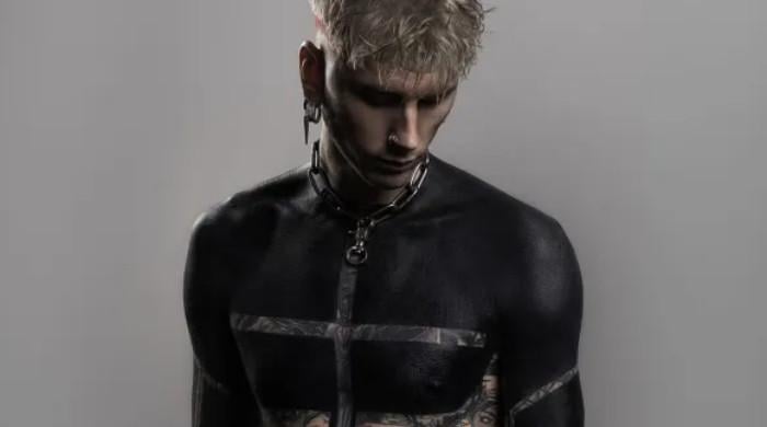Machine Gun Kelly goes full-show with body art at Paris Fashion Week